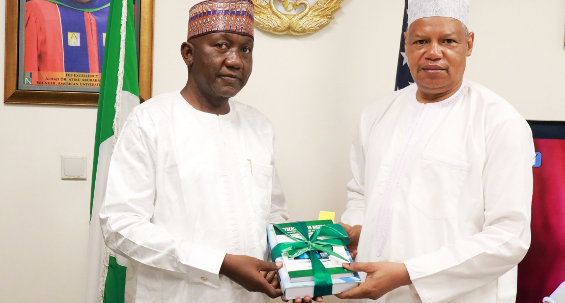 Professor Ahmadu Donates Books to AUN Libraries