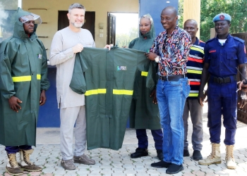 President Frazier Donates Raincoats to AUN Security Department