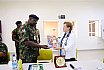 Delegation leader, Brigadier-General M.T. Ahmed, presenting a souvenir to President Ensign - Group photograph of visiting Course 44 Participants and senior AUN management