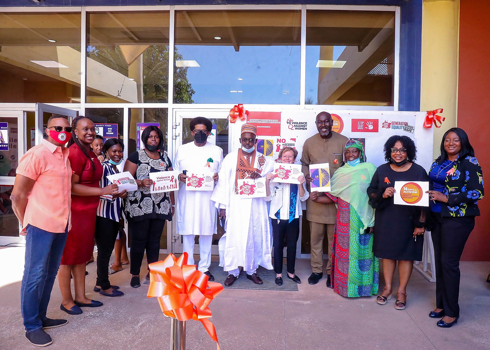 Ribbon cutting ceremony to launch the AUN Community's participation in  End Violence Against Women Now"!