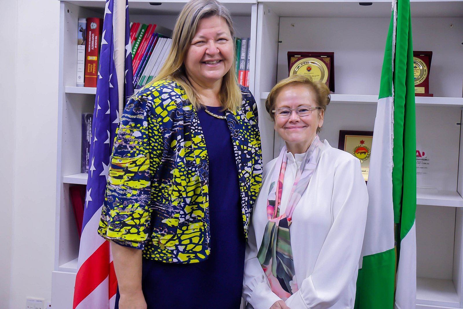 President Margee Ensign (r) receiving Ms. Jeane Clark, Spokesperson of U.S Embassy in Nigeria