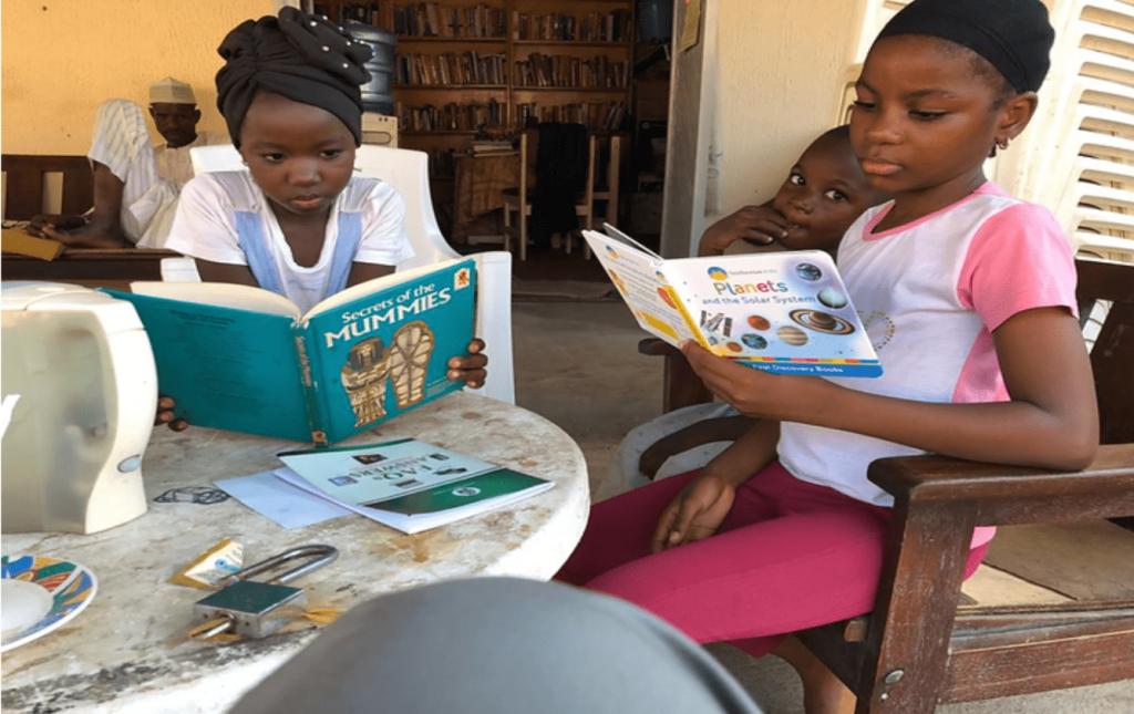 Children reading at the library